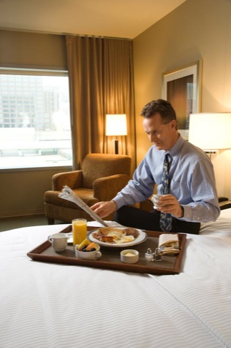 Businessman with Hotel Room Service