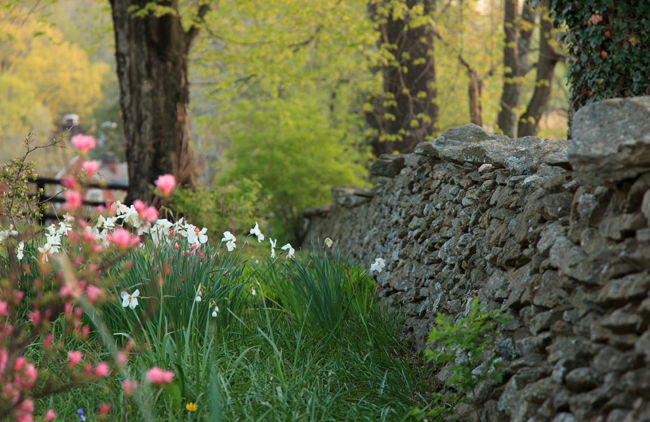 Stone wall and flowers at Goodstone Inn
