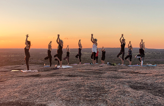 Yoga at Enchanted Rock State Natural Area, by Miguel Lecuona