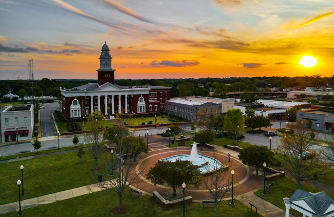 Embrace the charm of Downtown Opelika, where history meets modern vibrancy. From the iconic Lee County Courthouse to the bustling courthouse square and quaint shops, every corner tells a story of community and character.