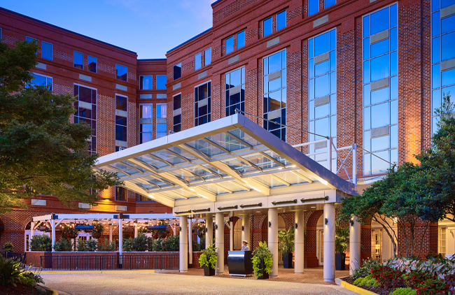 Step into luxury at the entrance of the Hotel at Auburn University. A warm welcome awaits, where Southern hospitality meets contemporary elegance. Your gateway to a memorable stay in the loveliest village on the plains.